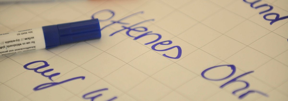 Textmarker und Text "offenes Ohr"