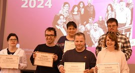 Menschen, die für ihre 10-jährige Tätigkeit bei job-inklusivo der Stiftung kreuznacher diakonie geehrt wurden