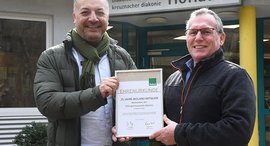 Zwei Personen: von links - Viktor Commichau, Leiter Arbeit & Qualifizierung, und Matthias Winau, Betriebsleiter der Werkstatt in der Asbacher Hütter